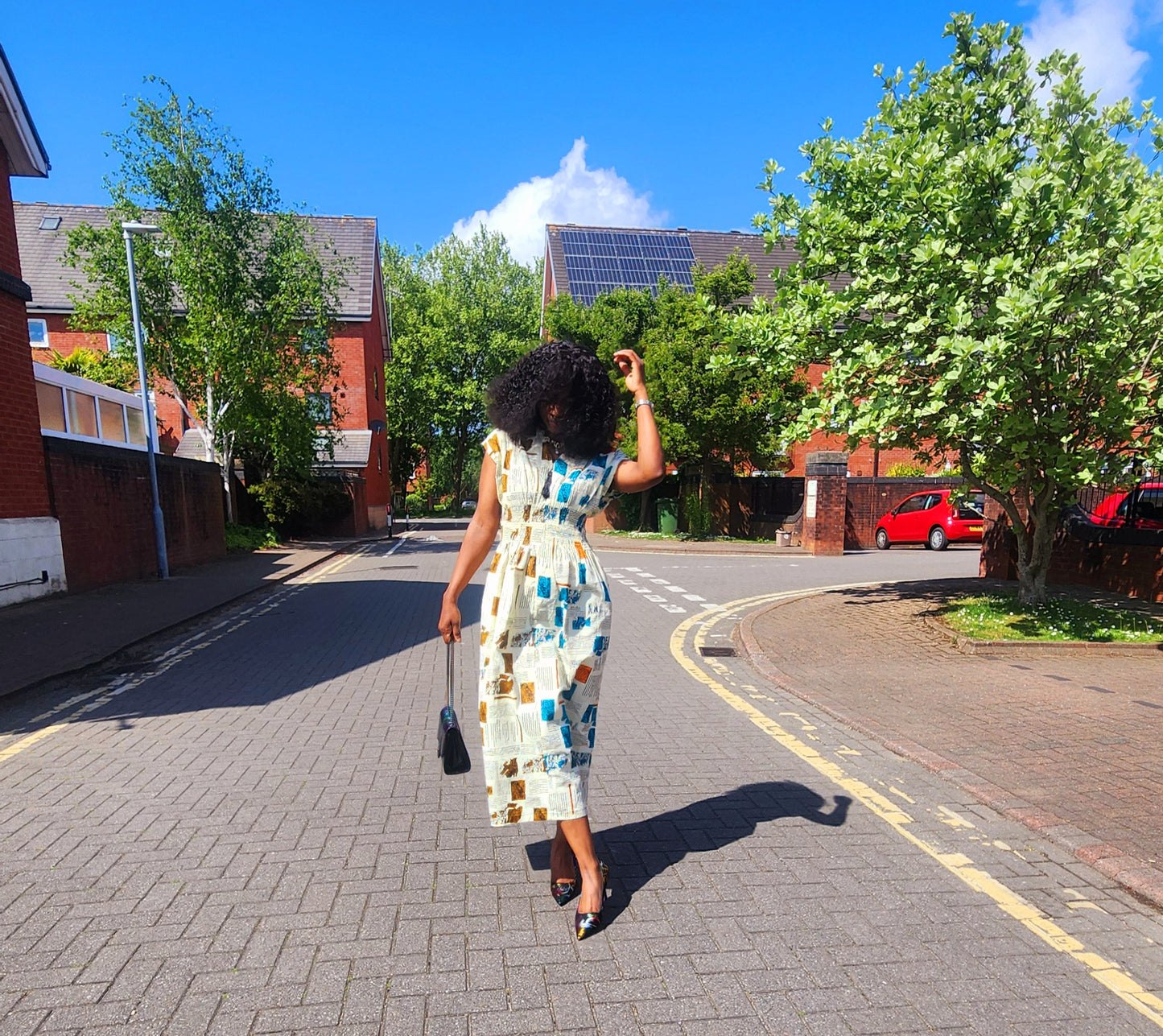 A Priscy Newspaper dress